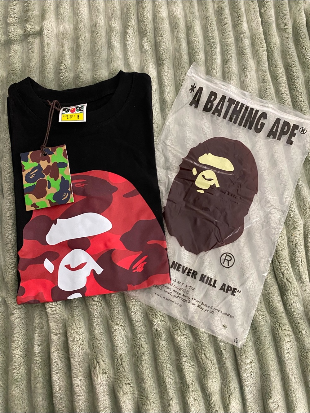 Bape Black Tee with Red Camo Ape Head Graphic